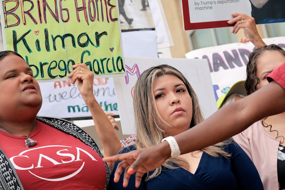 Jennifer Vasquez Sura, right, the wife of Kilmar Abrego Garcia, is joined by supporters and advocates at a rally in front of the U.S. District Court for Maryland ahead of a hearing on his case on July 7, 2025 in Greenbelt, Maryland.