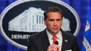 Acting Attorney General Todd Blanche speaks at a Department of Justice press conference.