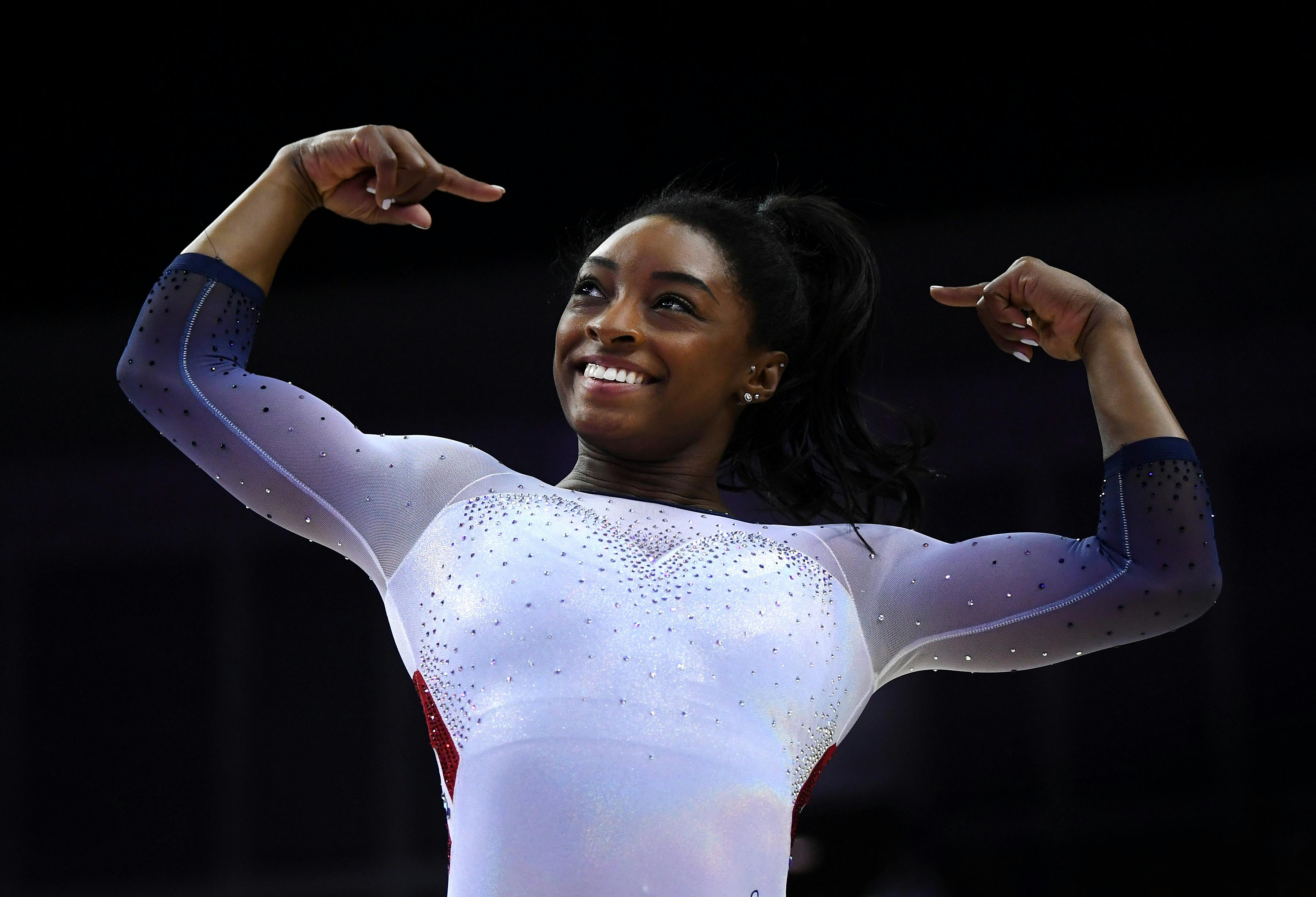 US gymnast Simone Biles celebrates after a gymnastics competition.