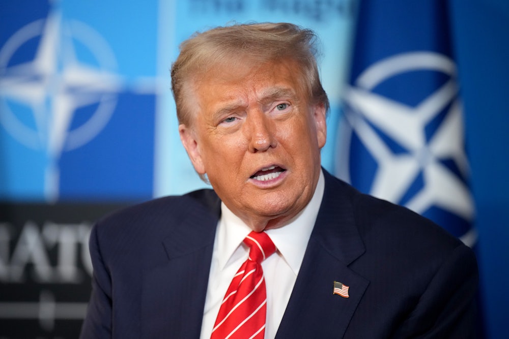 Donald Trump speaks during the NATO summit at The Hague