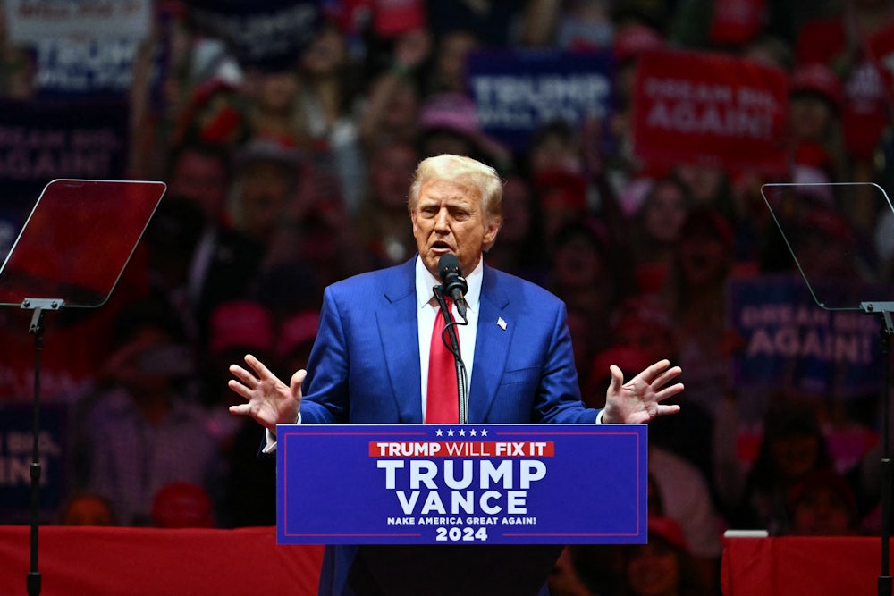 Donald Trump speaks with spread hands