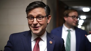 Mike Johnson smiles.