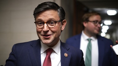 Mike Johnson smiles.