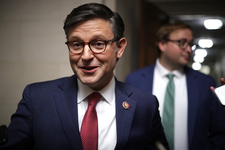 Mike Johnson smiles.