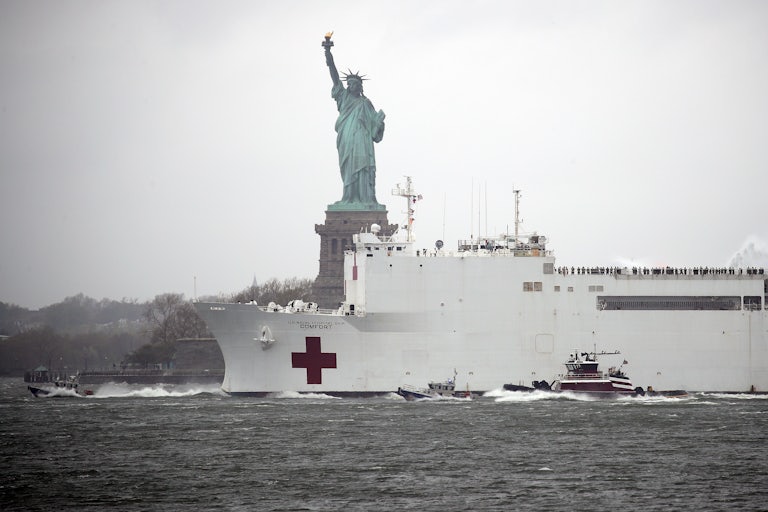 The emergency hospital ship, USNS Comfort, leaving New York in April 2020