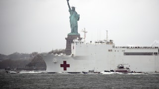The emergency hospital ship, USNS Comfort, leaving New York in April 2020