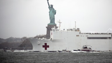 The emergency hospital ship, USNS Comfort, leaving New York in April 2020