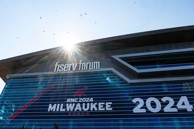 The Fiserv Forum with a large sign that reads RNC 2024 Milwaukee
