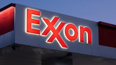 The Exxon logo at a gas station