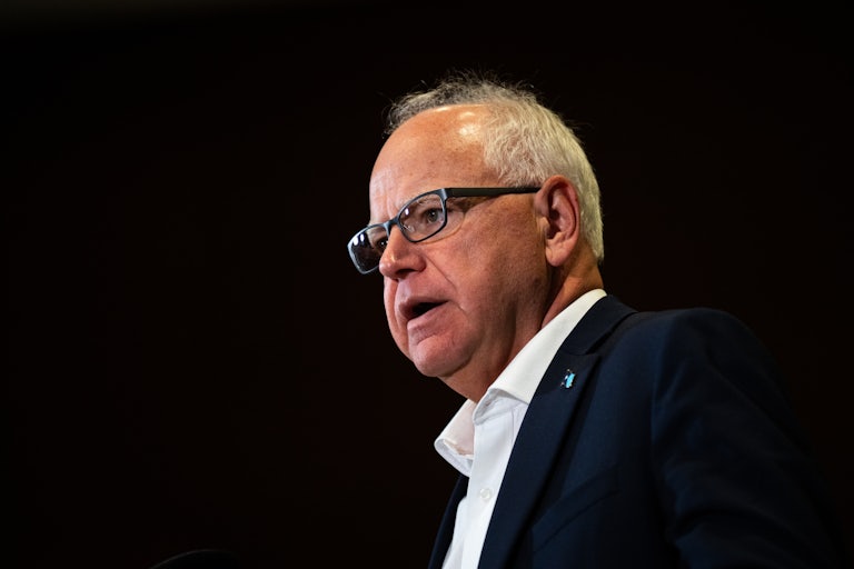 Kamala Harris’s running mate Tim Walz is seen from the side