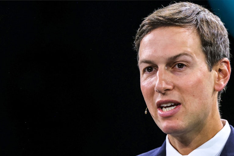 Jared Kushner speaks while wearing a headset microphone