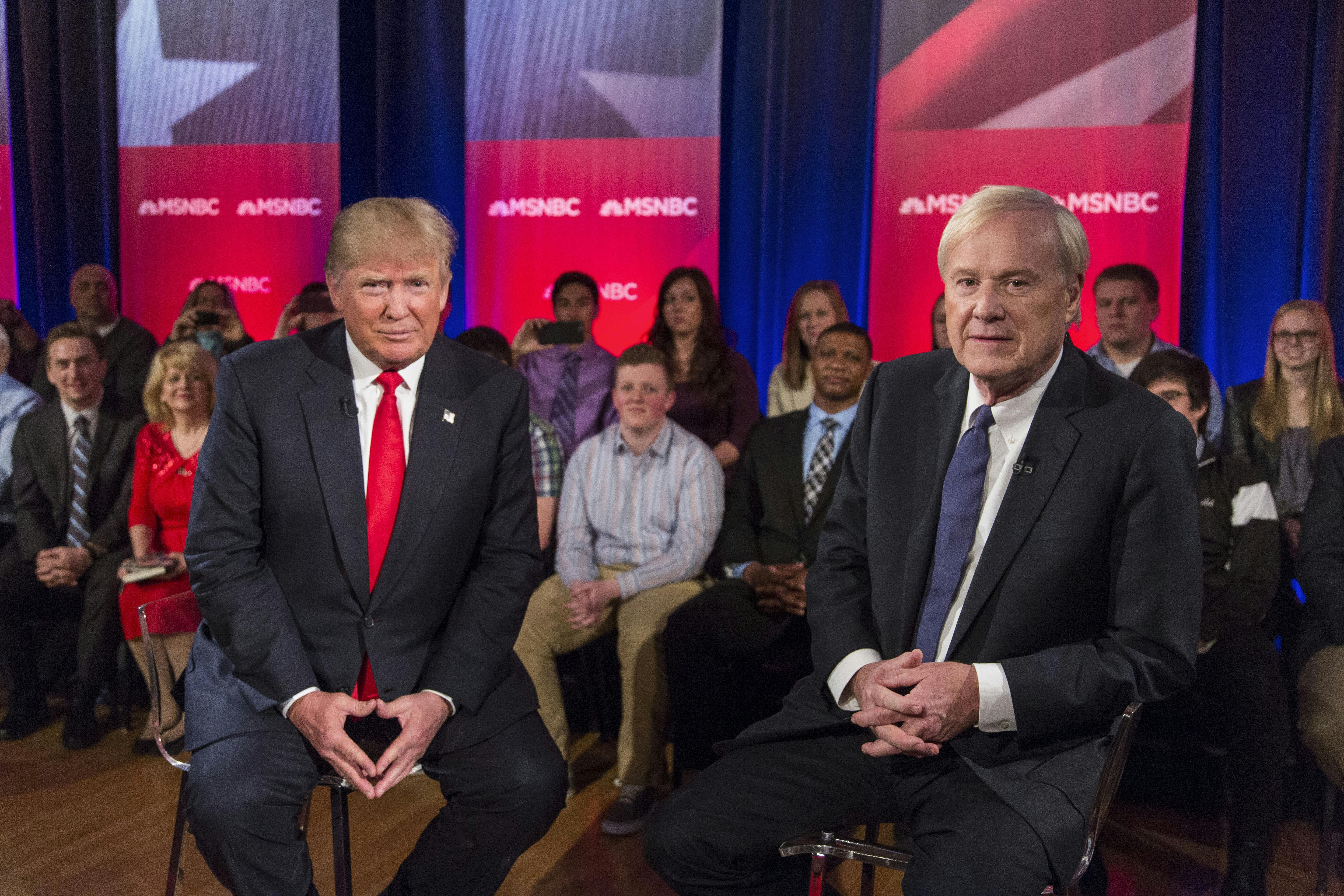 Donald Trump and MSNBC's Chris Matthews sit on stage at a town hall event in Wisconsin.