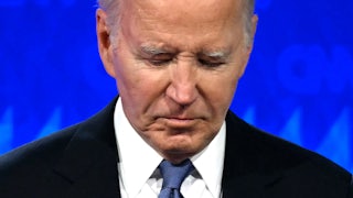 Joe Biden looks down at the debate.