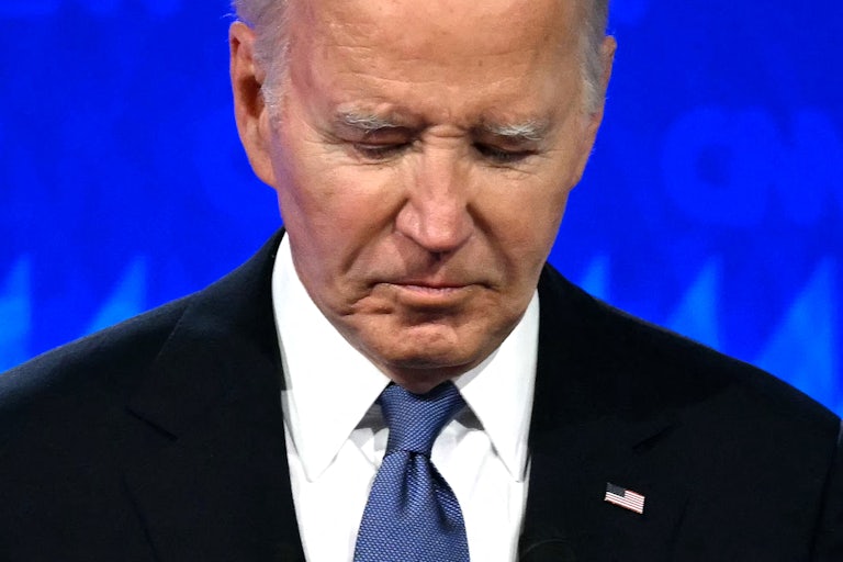 Joe Biden looks down at the debate.