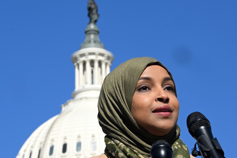 Ilhan Omar speaks while standing in front of the U.S. Capitol