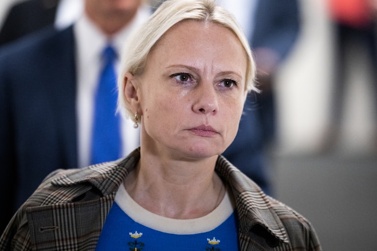 Victoria Spartz walks in the Capitol