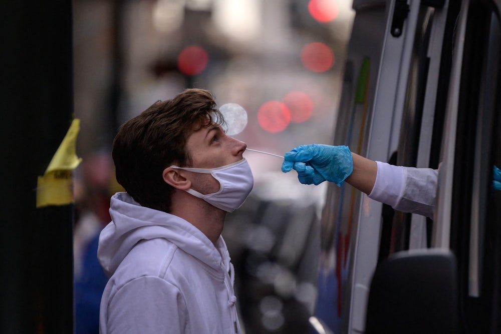 A man receives a nasal swab.