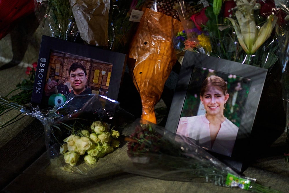 Framed photos of shooting victims Mukhammad Aziz Amurzokov and Ella Cook at a makeshift memorial