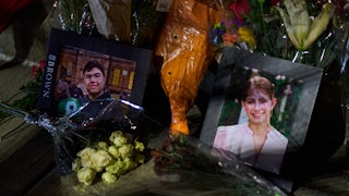 Framed photos of shooting victims Mukhammad Aziz Amurzokov and Ella Cook at a makeshift memorial