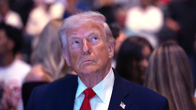 Donald Trump looks upward with an irritable expression