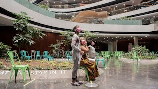 A family at the Discovery vaccination site in Johannesburg