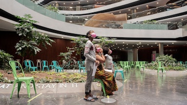 A family at the Discovery vaccination site in Johannesburg