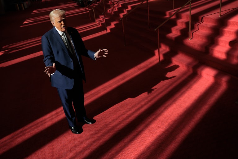 Donald Trump talks to the media in the Grand Foyer during a tour at the John F. Kennedy Center for the Performing Arts.