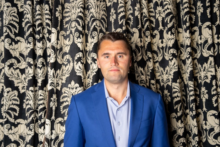 Charlie Kirk poses at The Cambridge Union on May 19, 2025 in Cambridge, Cambridgeshire.