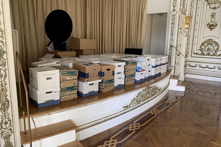 Stacks of boxes are stored in the ballroom of Donald Trump’s resort Mar-a-Lago