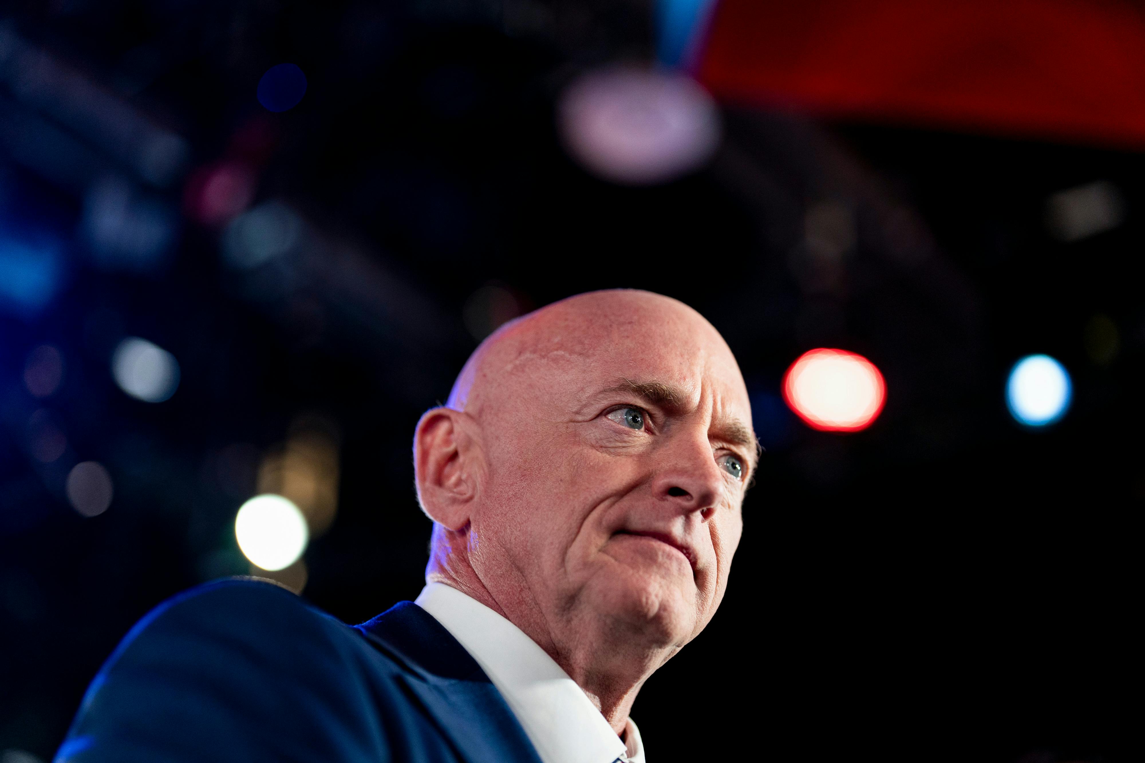 Senator Mark Kelly at a press conference.