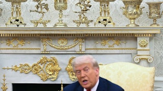 Gold colored ornaments and decor are seen as President Donald Trump speaks during a meeting in the Oval Office.