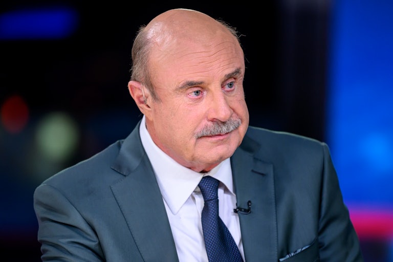 Dr. Phil listens to someone not picured on screen.