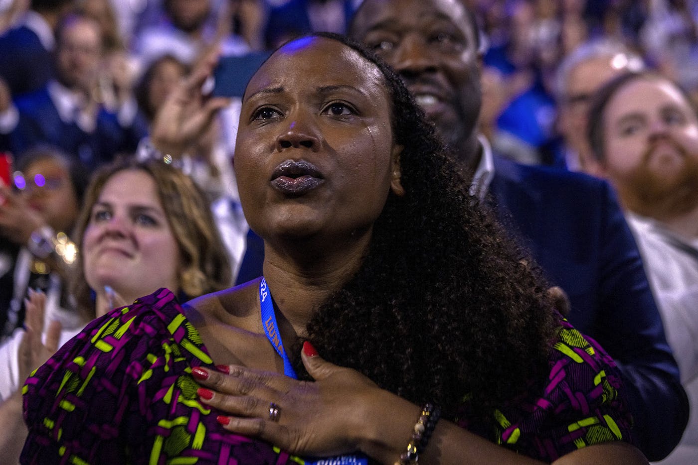 A delegate reacts while listening to “the Central Park Five” 