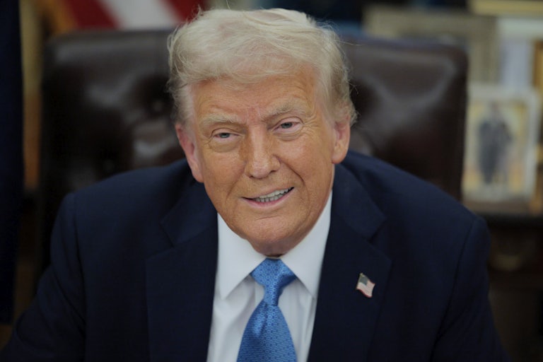 Donald Trump smiles creepily