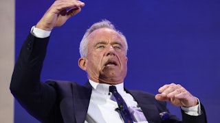 Health Secretary Robert F. Kennedy Jr. makes hand gestures while speaking.
