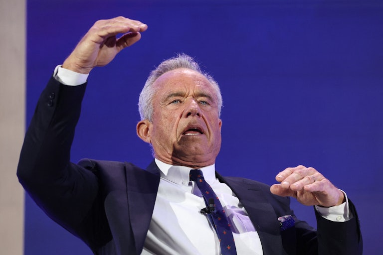 Health Secretary Robert F. Kennedy Jr. makes hand gestures while speaking.