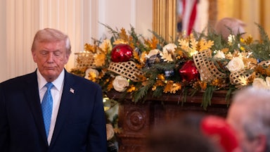 Donald Trump looks on during a Hanukkah reception at the White House.