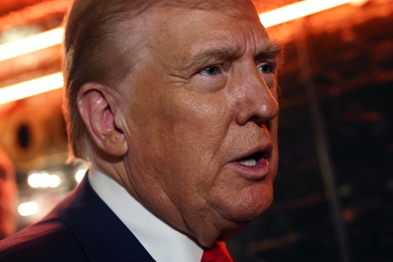 Donald Trump looks shocked, close-up photo