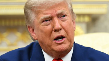 Donald Trump stares while speaking.
