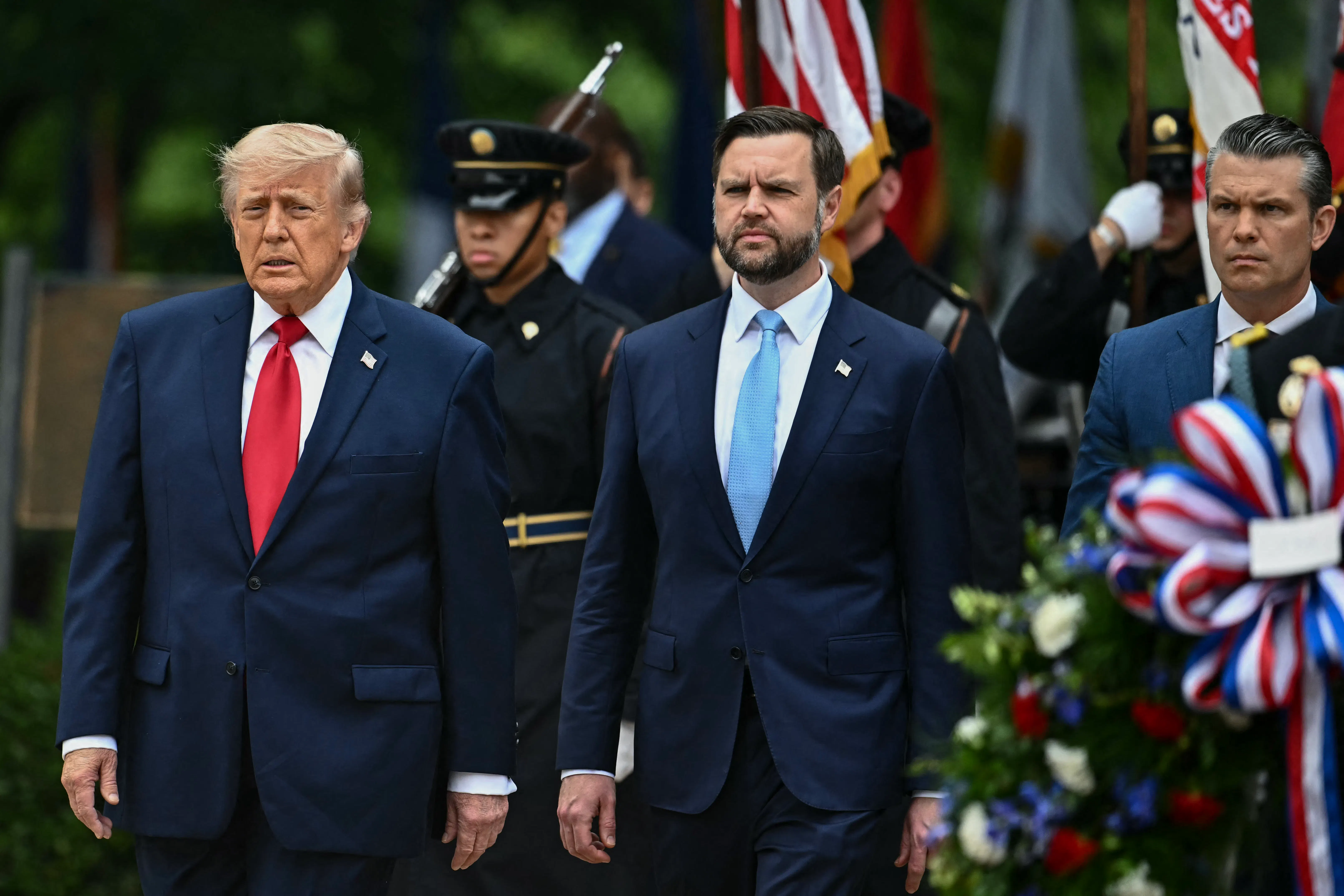 President Donald Trump, Vice President JD Vance, and Defense Secretary Pete Hegseth stand side by side.