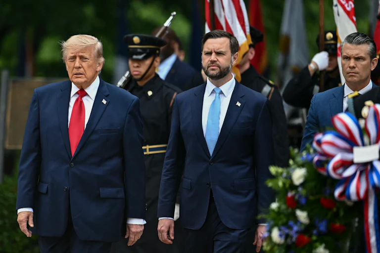 President Donald Trump, Vice President JD Vance, and Defense Secretary Pete Hegseth stand side by side.
