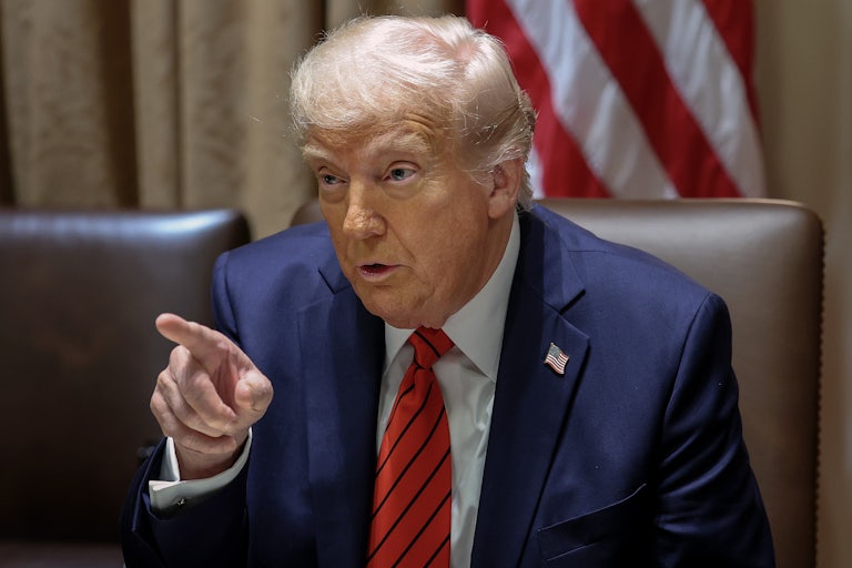 Donald Trump points as he speaks.