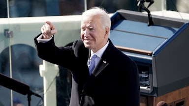 President Joe Biden points after taking the oath of office during the presidential inauguration.
