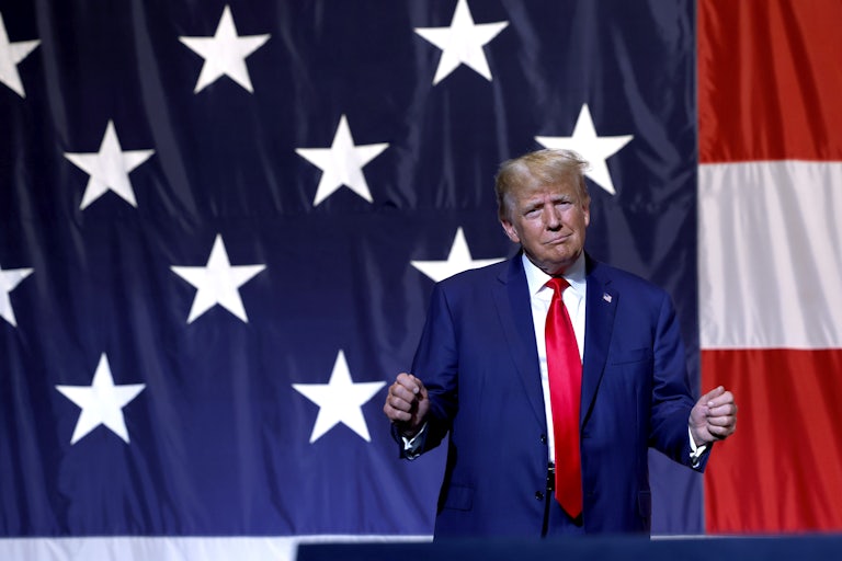 Donald Trump gestures with his fists