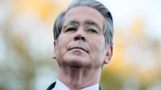 Treasury Secretary Scott Bessent stands outside the White House