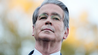 Treasury Secretary Scott Bessent stands outside the White House