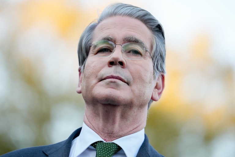 Treasury Secretary Scott Bessent stands outside the White House