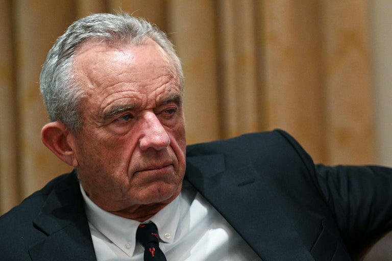 RFK Jr. listens at Trump's Cabinet meeting.