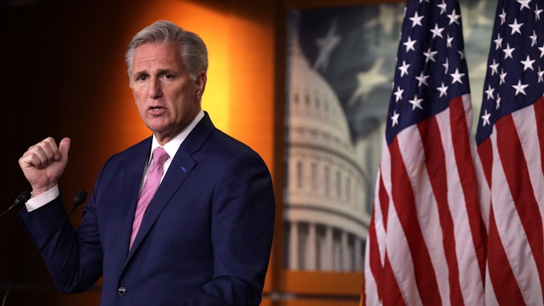 Kevin McCarthy speaks at a podium.