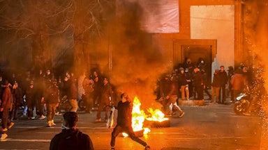 People gather during a protest in Tehran